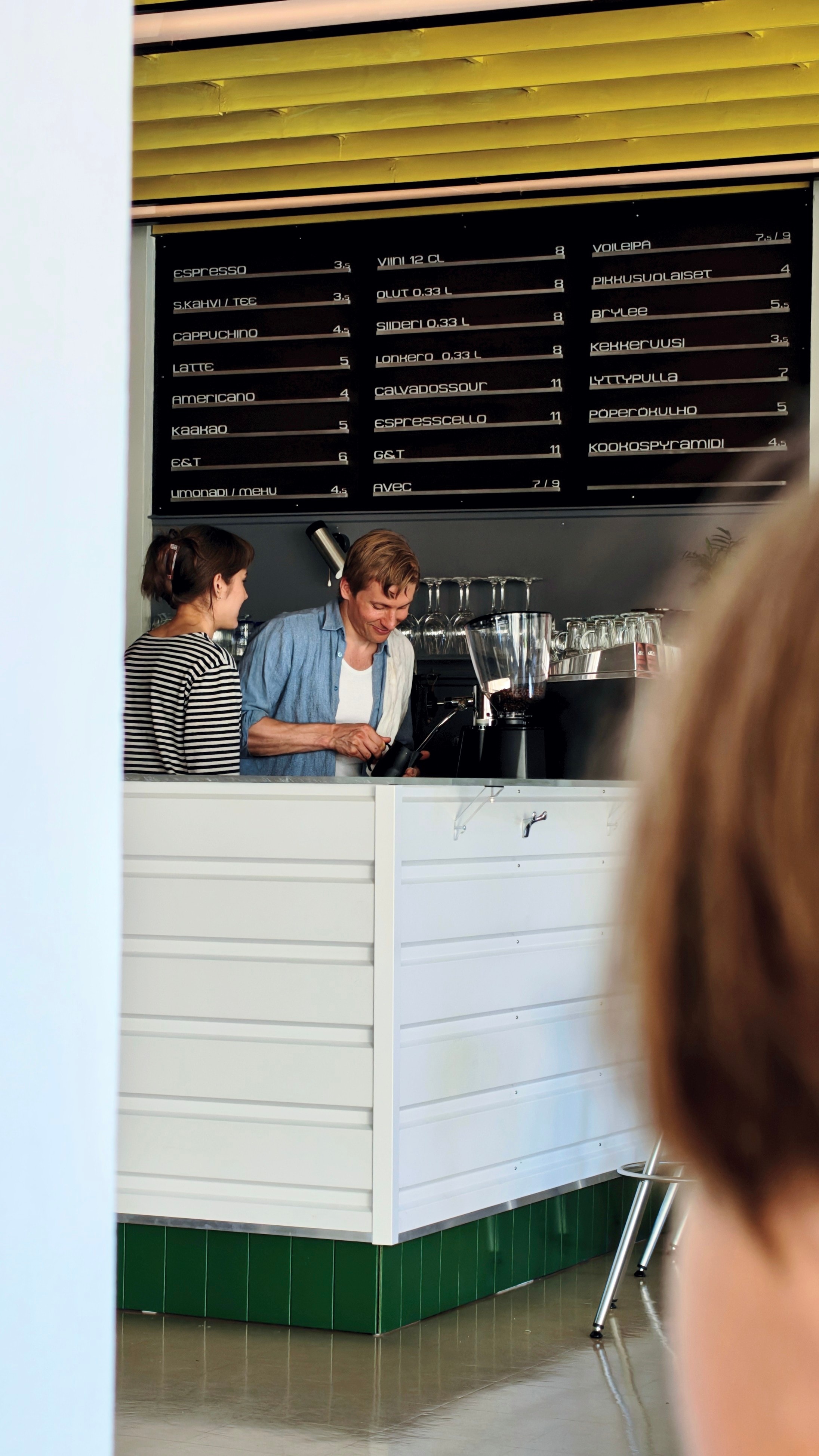 Nöösi staff behind the café counter